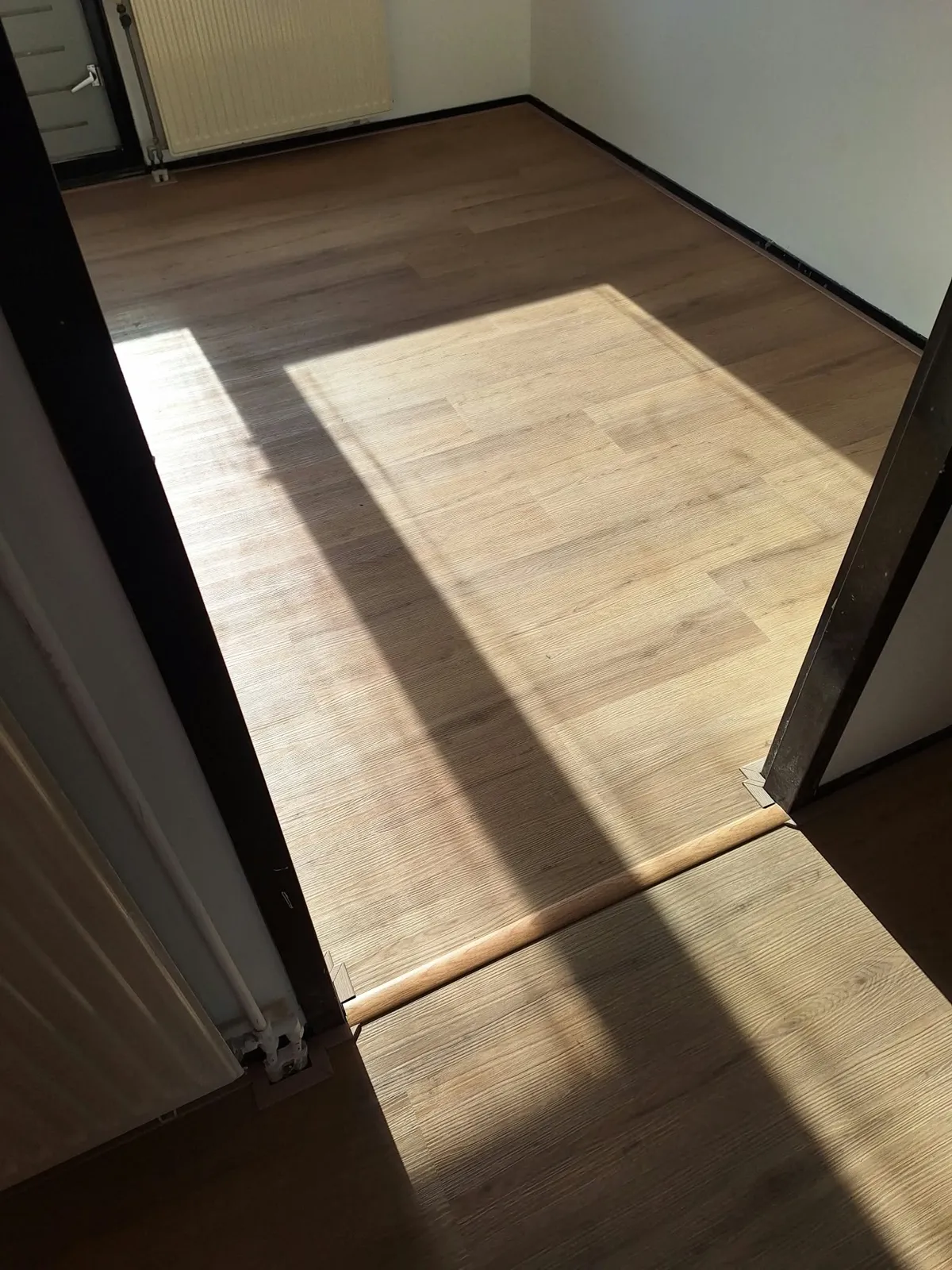 QA Renovatie: PVC plank zon