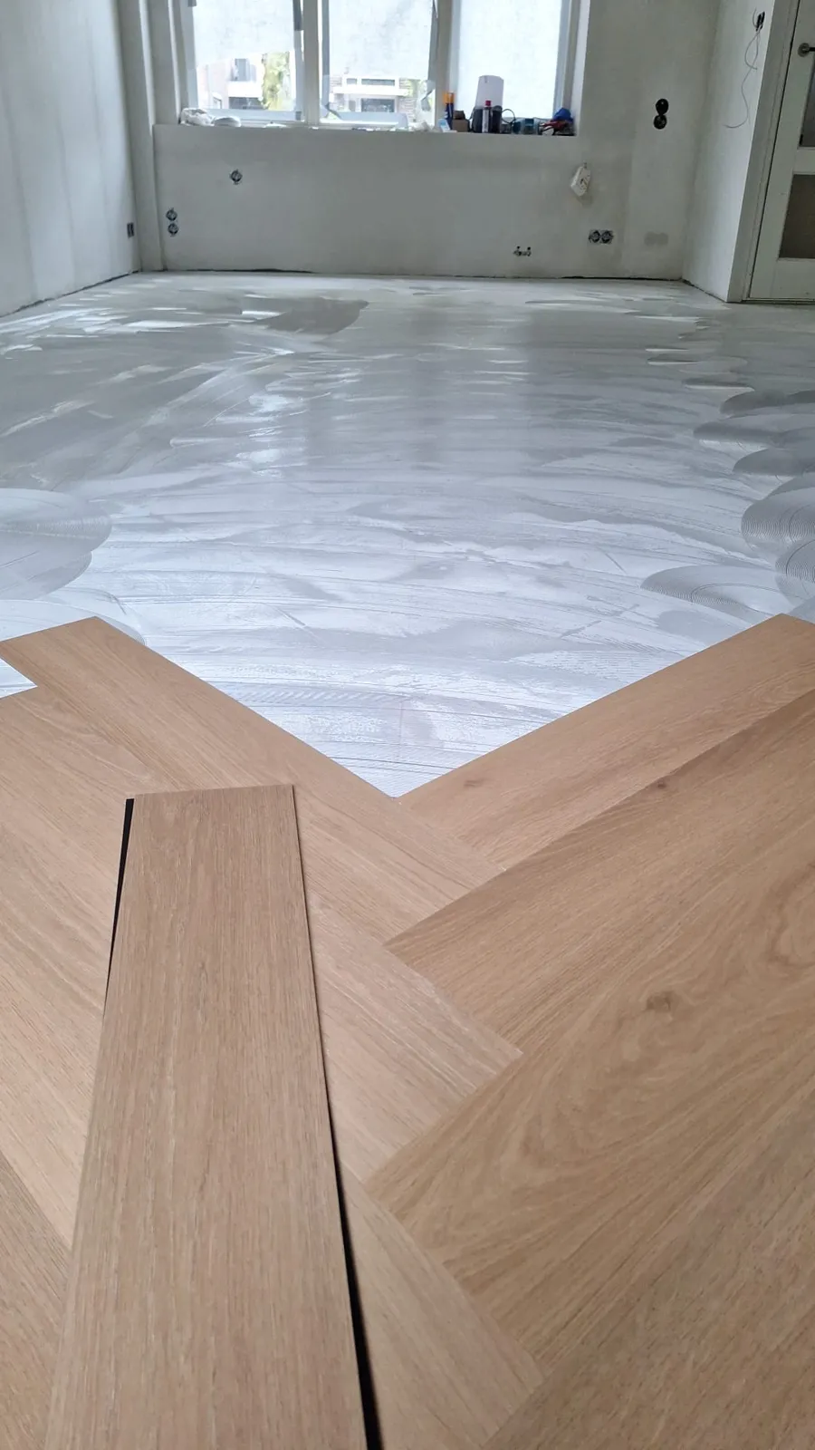 QA Renovatie: PVC visgraat op egaliseren