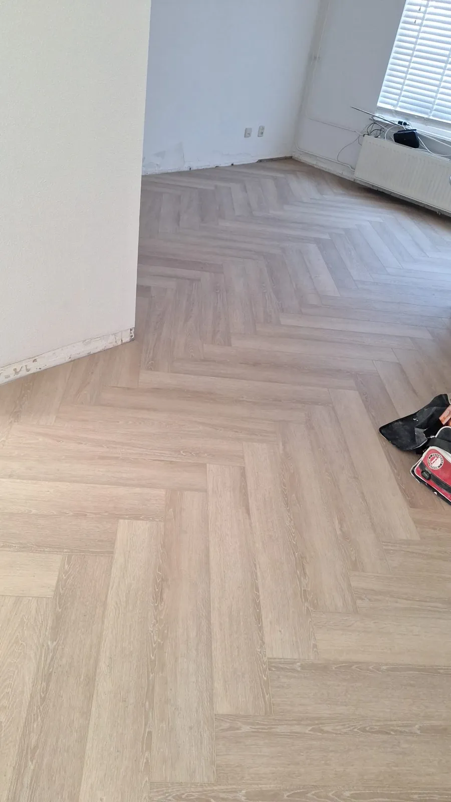 QA Renovatie: PVC visgraat woonkamer